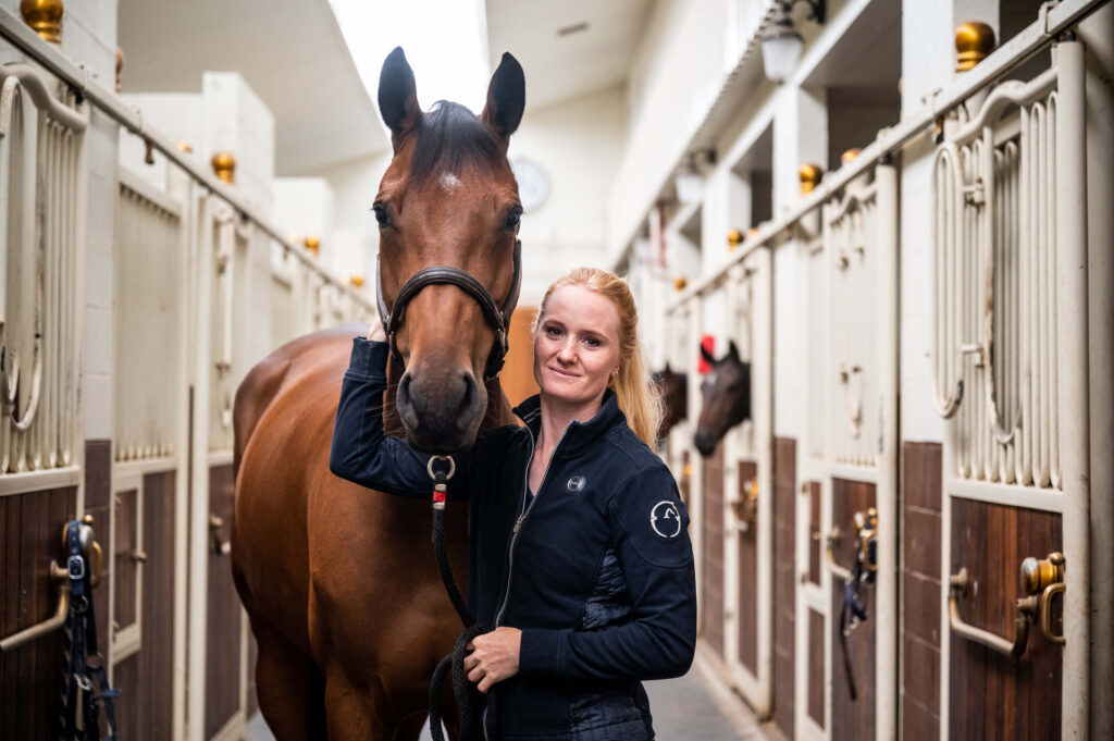 Emilie Stampfer with one of her Show Jumpers